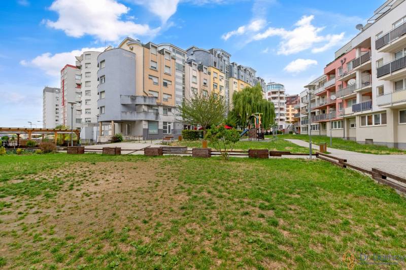 Apartment buildings and a children's playground on Kresánkova Street in Bratislava - Karlova Ves.