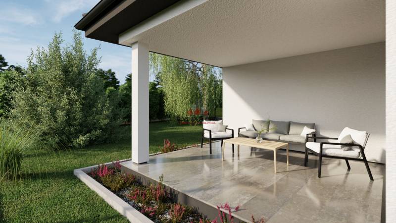 The terrace of a family house on Pánska Niva street, seating, greenery, and flowers.