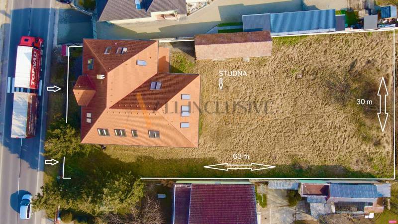 Aerial view of the building and property on Chrabrany Street in Topoľčany with a well.