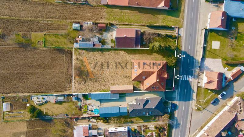 Aerial view of a house with yards by the road on Chrabrany Street, Topoľčany.