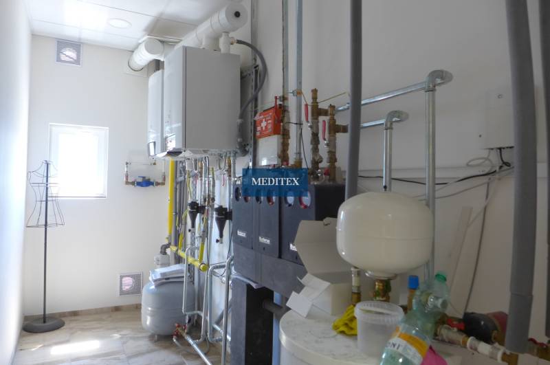 Technical room with heating and maintenance equipment, warehouses and halls.