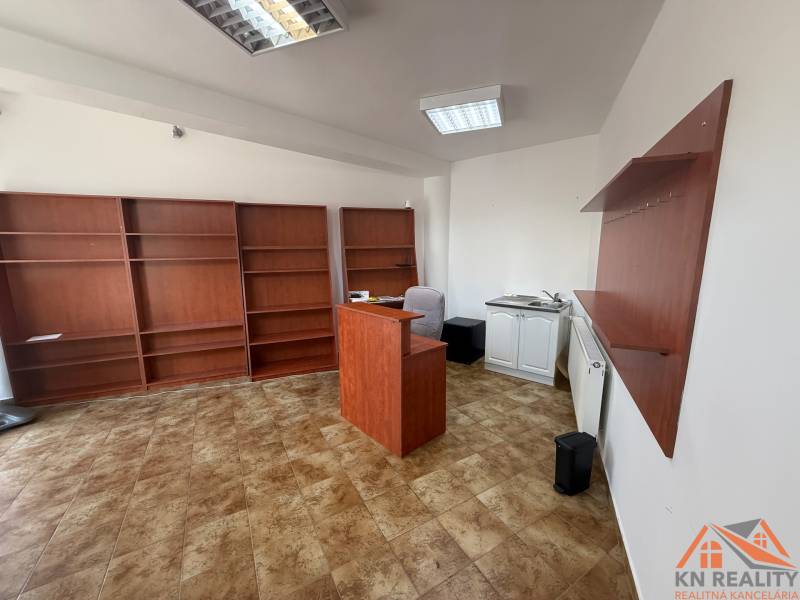 Offices with shelves, a counter, and a cabinet with a sink.