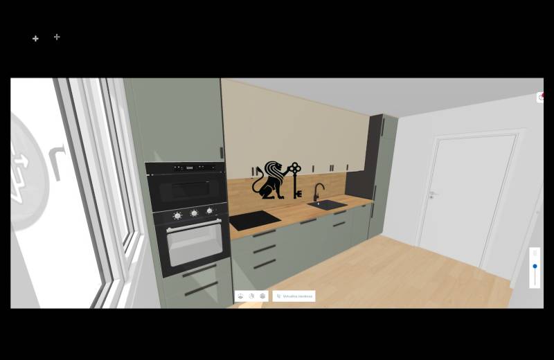A kitchen in a 2-room apartment with built-in appliances and a wooden countertop.