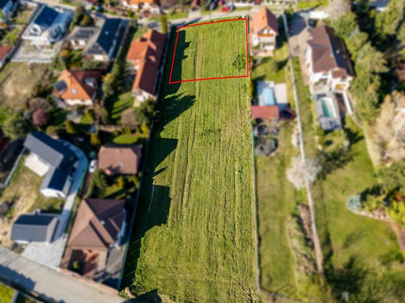 Plots - housing on Štúrova Street in Marianka, surrounded by family houses.