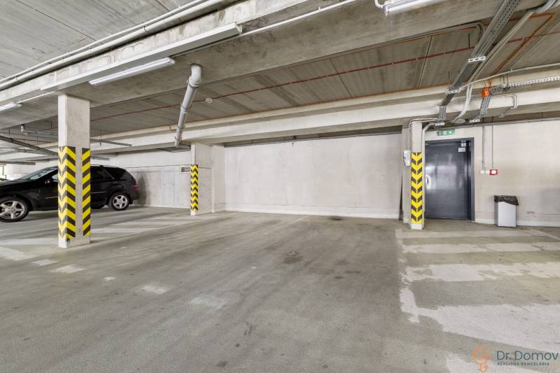 Underground garage in Bratislava - Ružinov on Jégého Street, next to a 2-room apartment.