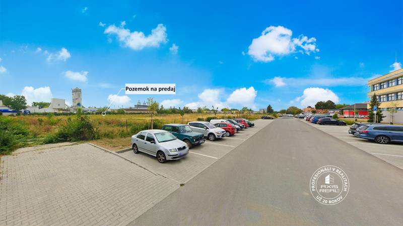 Parking lot next to a commercial property on Priemyselná Street in Piešťany.