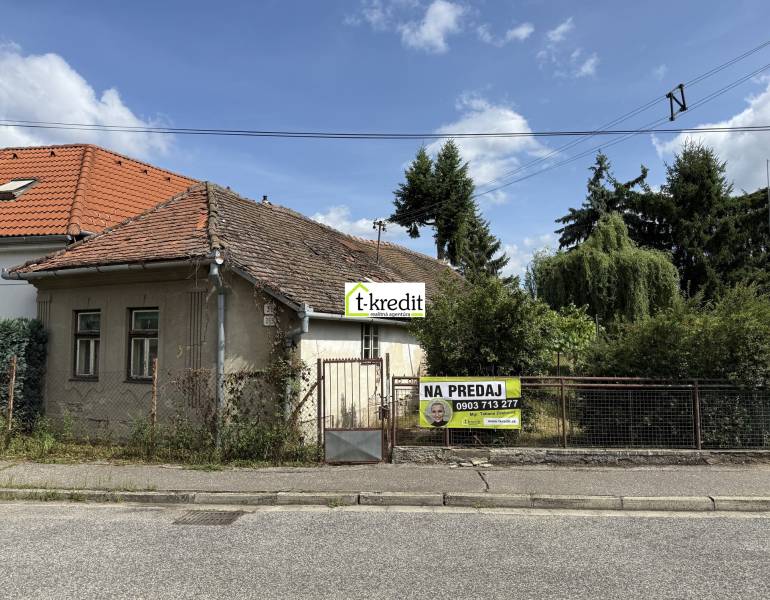 Older house for sale in Zlaté Moravce with land for residential use.