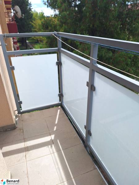 A balcony with a view of greenery in a 2-room apartment on Pavlovičovo námestie, Prešov.