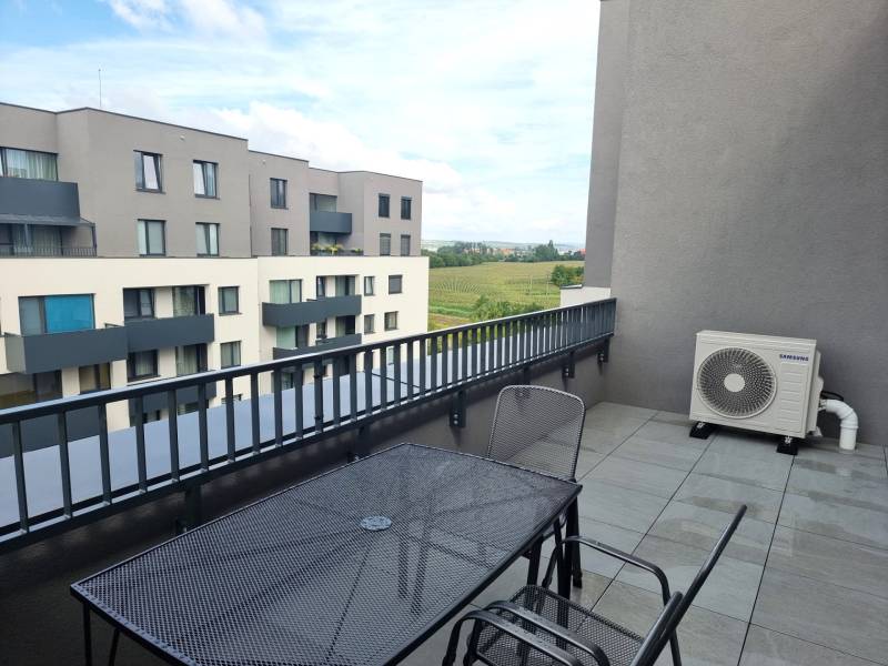 Terrace of a 3-room apartment on Pieskova Street in Nitra with a view of the surroundings.