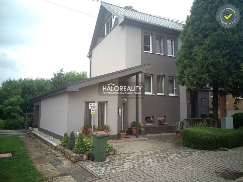 A family house in Nováky with a well-maintained garden, parking space, and landscaped surroundings.