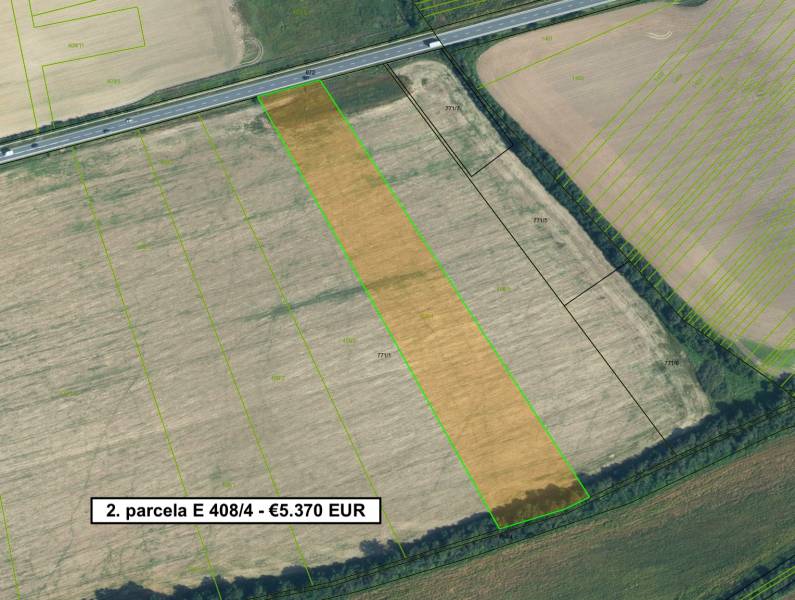 Aerial view of agricultural and forest land near Lučenec with a marked parcel.