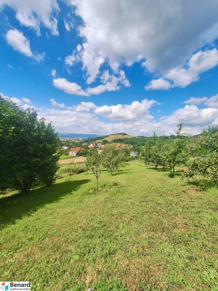 Land for residential use in Bodovce, Bodovce Street, with fruit trees and panoramic views.