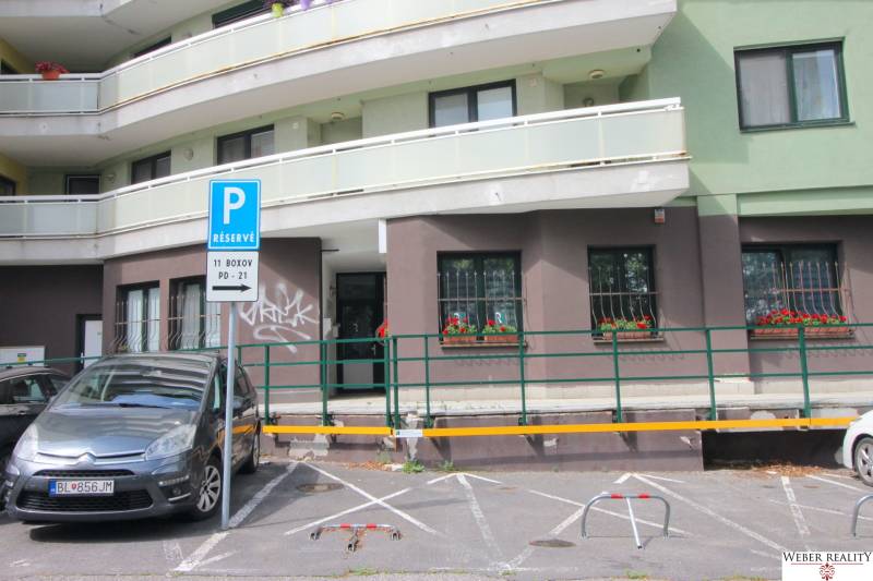 Parking lot in front of commercial premises on Žatevná Street in Bratislava - Dúbravka.