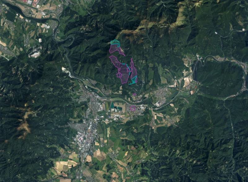 Aerial view of agricultural and forest lands around Sučany.
