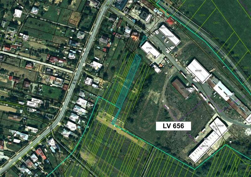 Aerial map of agricultural and forest lands in Topoľovka with plotted parcels and buildings.