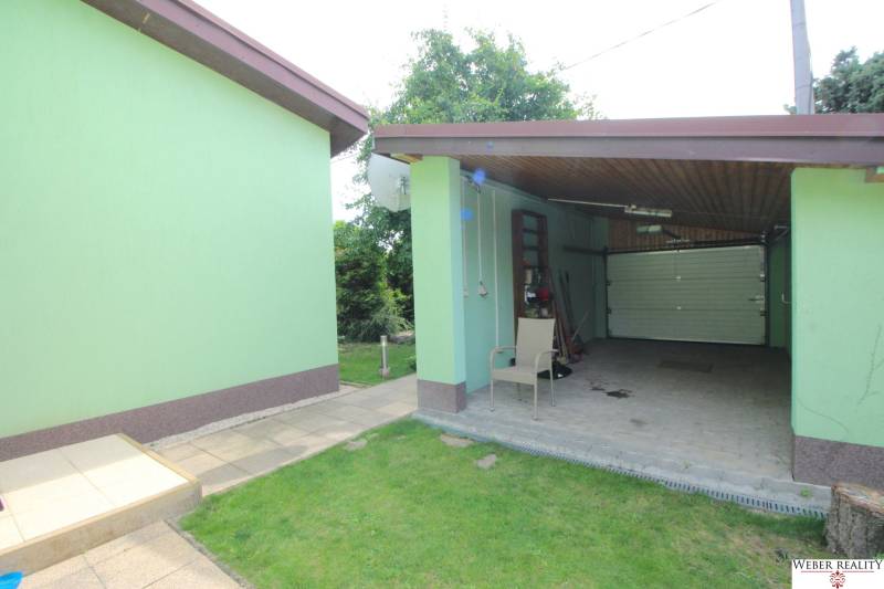 Green garage at a family house on Nové Záhrady VII in Bratislava - Ružinov.