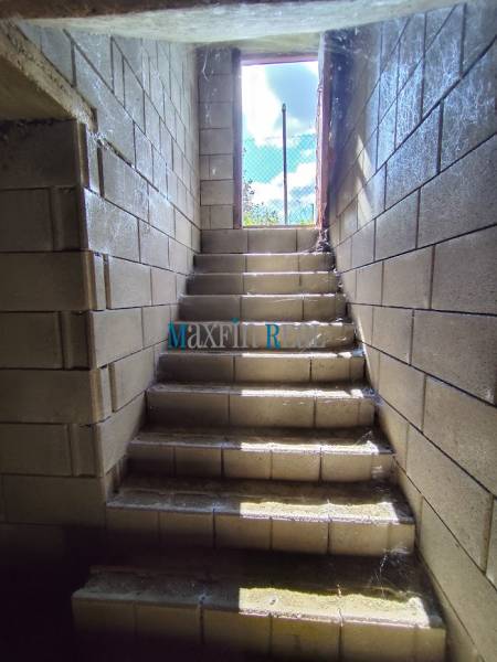 The staircase leading out from the underground spaces of the Lands - housing.
