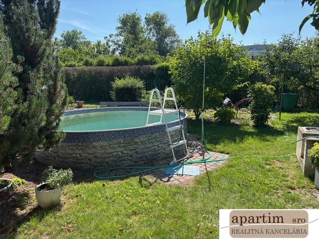 A swimming pool in the garden on Brezová Street, Bratislava - Vrakuňa, Residential plots.