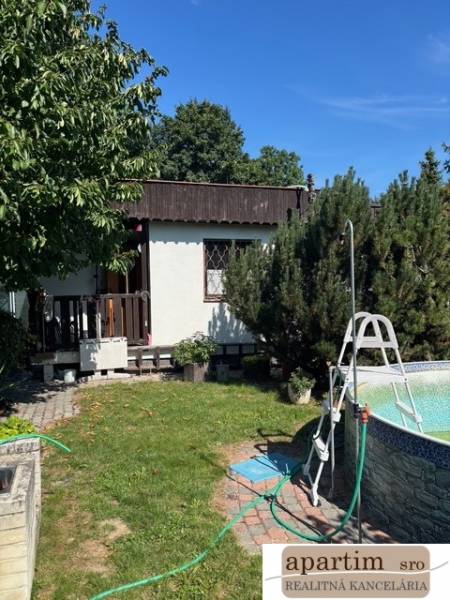 Garden with a swimming pool and garden cottage on Brezová Street in Bratislava - Vrakuňa, Residential plots.
