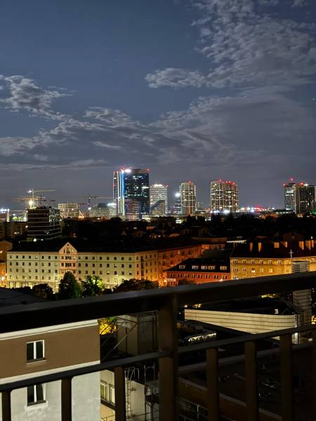 A night panoramic view of the Bratislava city center from the balcony of a 2-room apartment.
