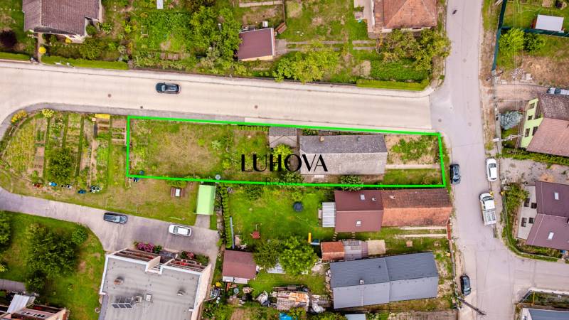 Aerial view of a plot with a family house in the village of Ladce on Pavla Koyša Street.