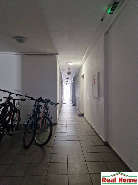 Hallway with bicycles in the building on Tehelná Street in Pezinok.