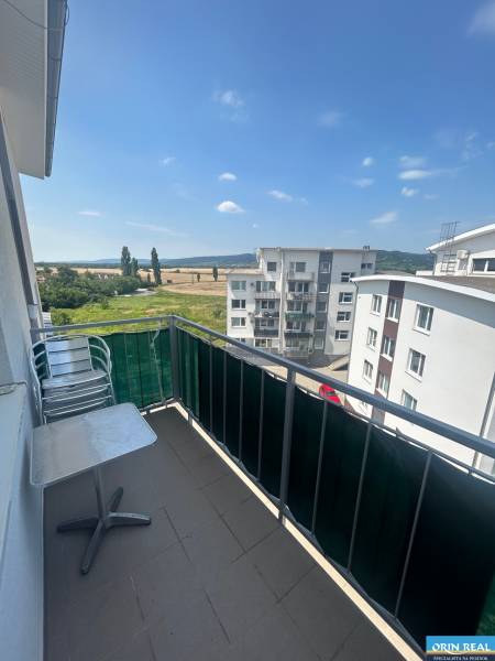 The balcony of a 3-room apartment on Slavomírova Street in Slovenský Grob with a view of nature.