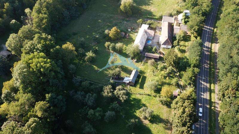 Aerial view of a building, trees, on A.H. Škultétyho Street, residential plots.