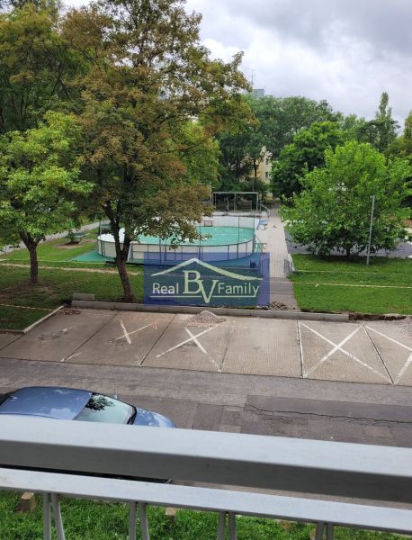 View from a 3-room apartment on Ostredkova Street in Bratislava - Ružinov with a parking lot.
