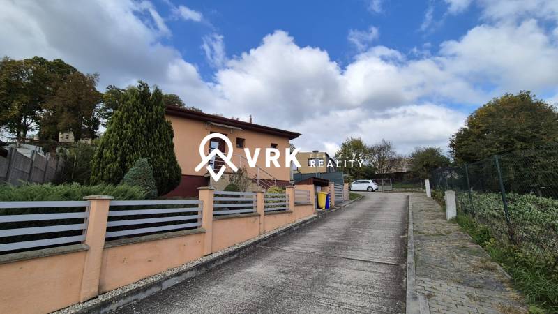 A family house in Ličartovce on Ličartovská Street with a driveway and a garden.