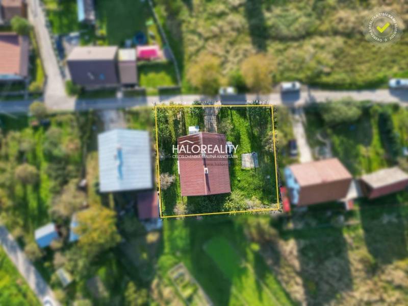Aerial view of a family house in the village of Papradno with greenery in the surroundings.