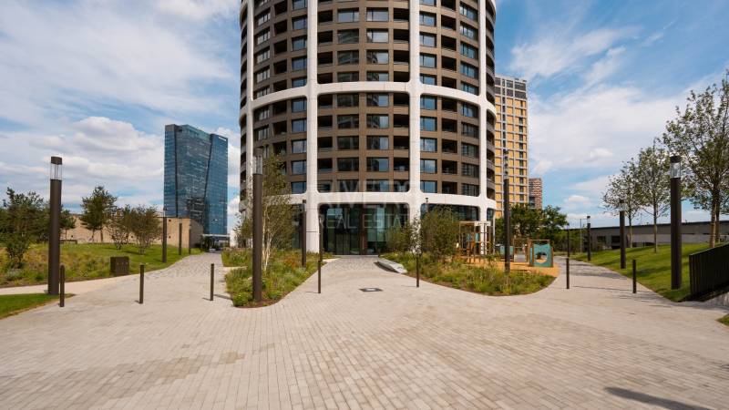 High-rise building and greenery in Bratislava - Old Town on Bottova Street, Garage area.
