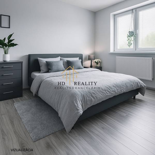 A bright bedroom in a family house with a comfortable bed and a wooden decor floor.