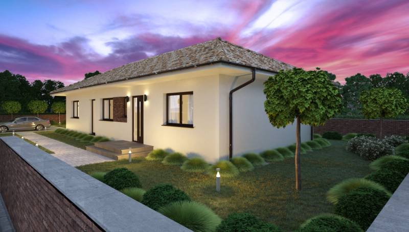 A family house in Gabčíkovo with a landscaped garden at sunset, with a paved driveway.