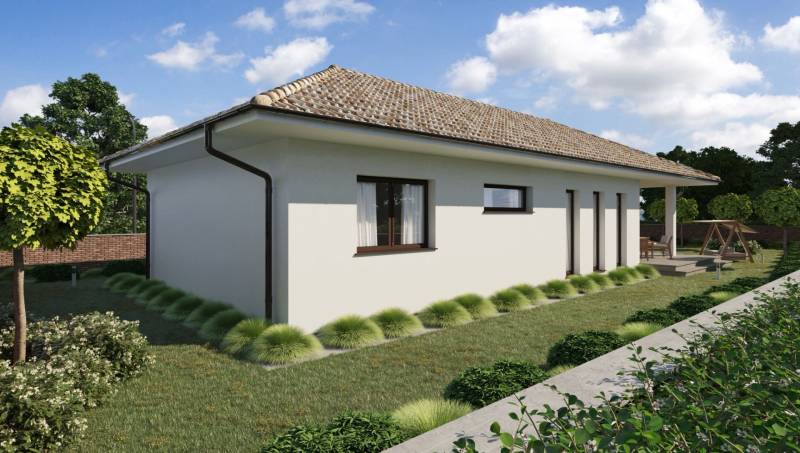 A family house in Gabčíkovo with a lawn, terrace, and ornamental plants.