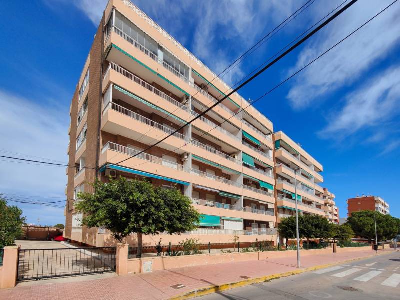 Residential complex on Calle Arrecife in Punta Prima, suitable for a 3-bedroom apartment.