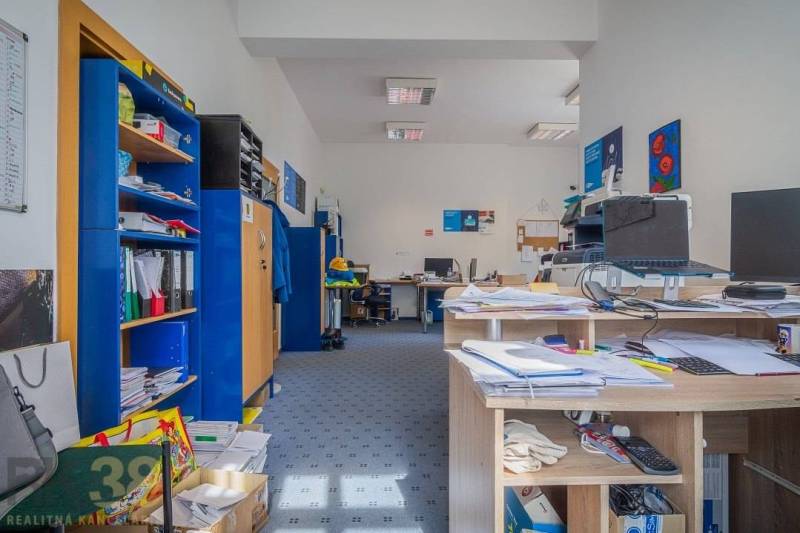 Office space in a building with carpet flooring, large windows, Poprad, Halatova.