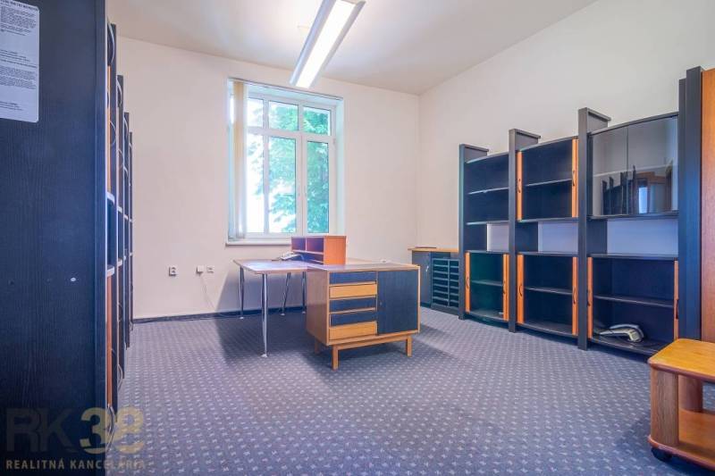 Office in a building with desks, chairs, and doors on Halatova Street in Poprad.