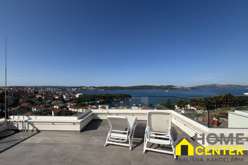 View from the villa in Trogir of the sea and surrounding islands, terrace with loungers.