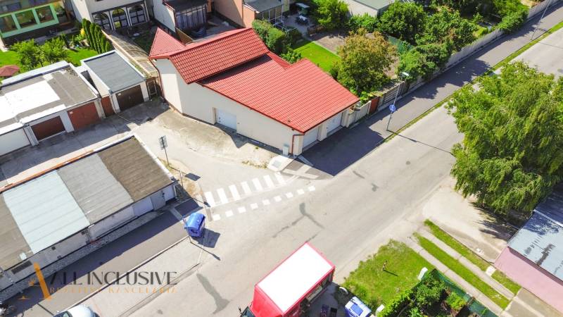 Aerial view of commercial premises in Dunajská Streda with a garden and parking.