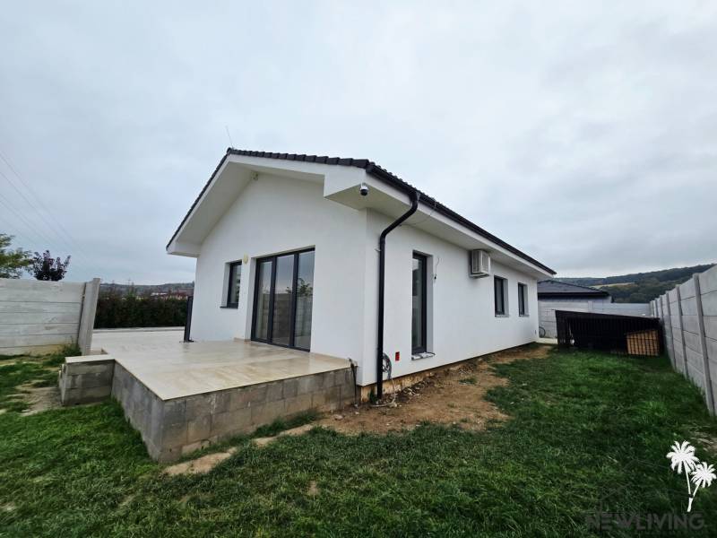 A family house on Veterná Street in Sokolovce with a terrace surrounded by a lawn.