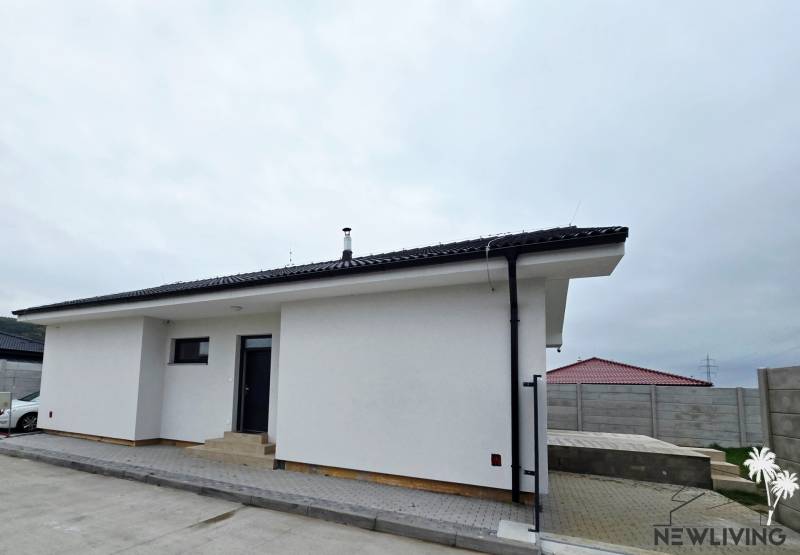 A family house on Veterná Street in Sokolovce with a white facade and a sloped roof.