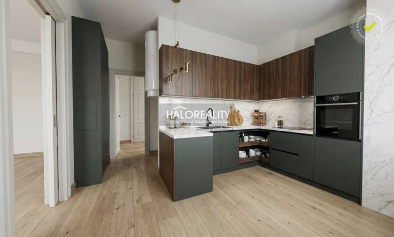 A spacious room with a wooden decor floor in a 2-room apartment.