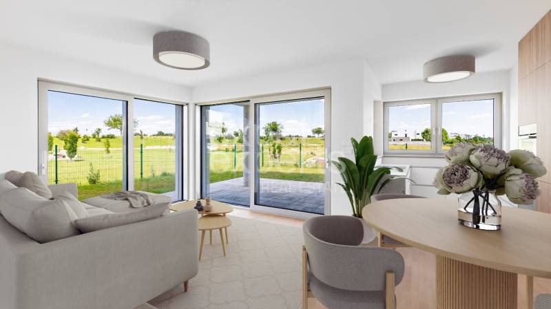 Living room in a 4-room apartment with a sofa bed and large windows with a view.