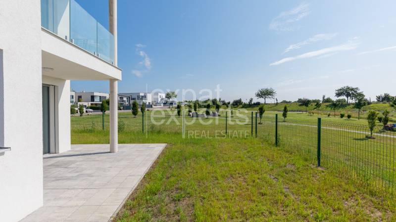 Terrace of a 4-room apartment in Kittsee, Am Seepark with a view of greenery.