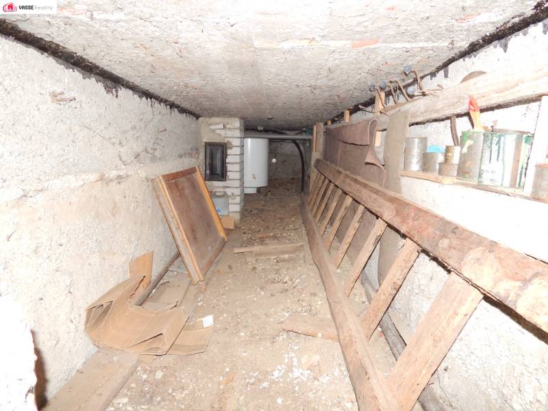 Underground space of the cottage with tools and barrels in Radvaň nad Dunajom.