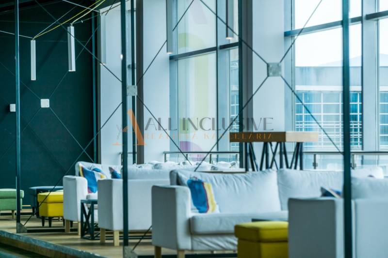 Comfortable seating with distinctive chairs and a wooden decor floor in dining areas.