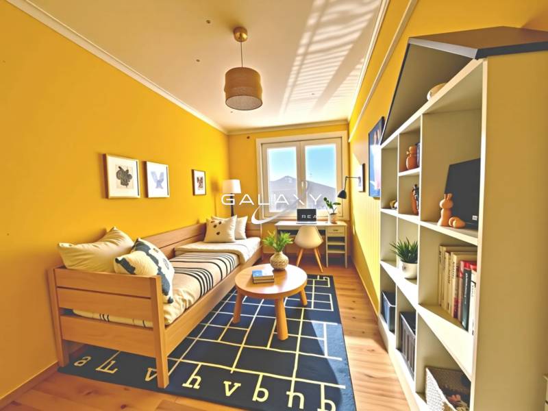 Yellow room with a bed, table, shelves, and a desk in a family house.