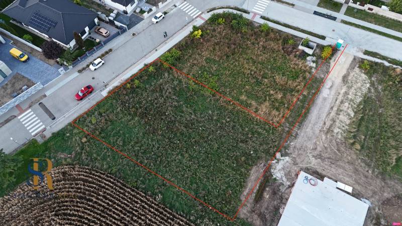 Aerial view of marked plots - housing in the village of Voderady.