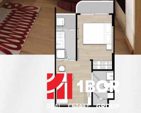 Floor plan of a 2-room apartment with wood-patterned flooring, showing the bathroom and bedroom.